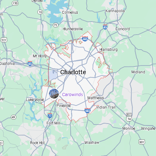 Map of Charlotte, North Carolina, highlighted by a red dotted boundary including the Carowinds amusement park.